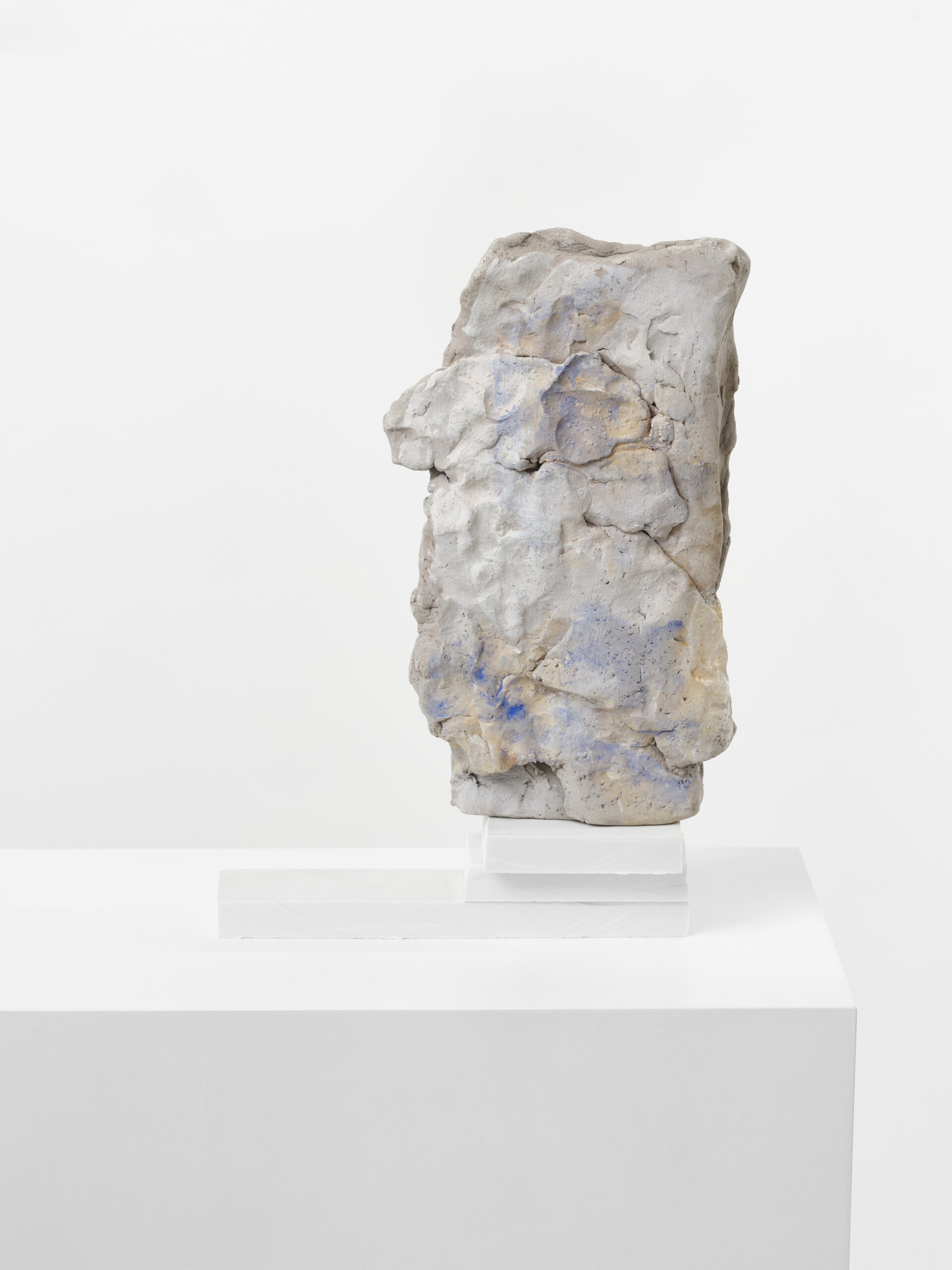 Ulrike Schulze	Choir Boy | Chorjunge	2023	
Painted ceramics, composite stone | Plinth: lacquered MDF	
37,7 x 27,5 x 8,5 cm | Plinth: 82,5 x 50 x 27 cm, total 120,2 x 50 x 27 cm