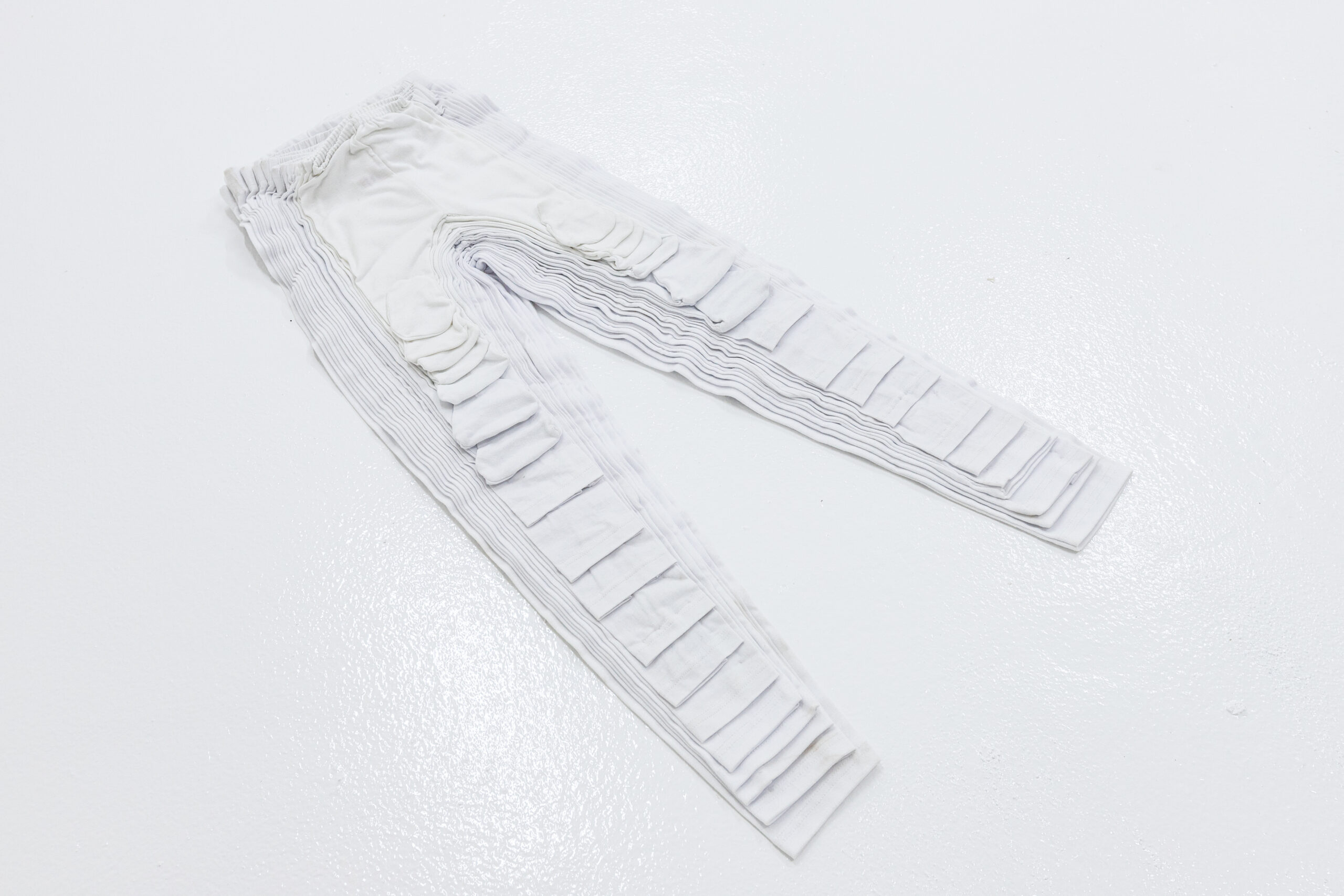 Stéphanie Saadé, Pyramid 2022, 
Leggings of all sizes from 0 month to XXL, thread, textile, variable dimensions