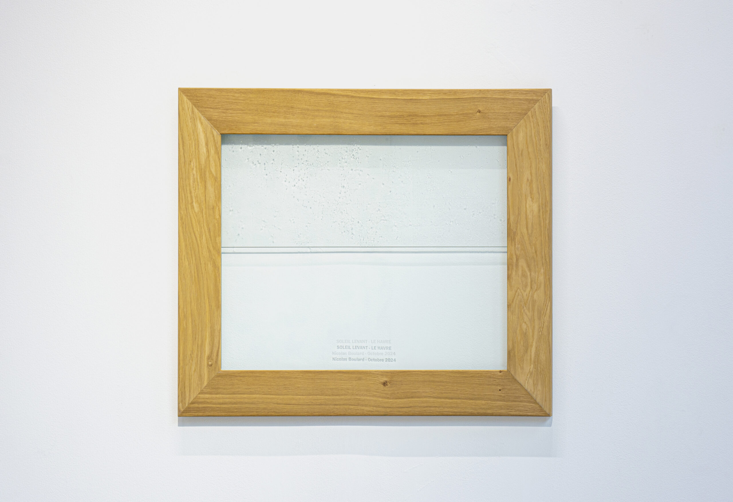 Nicolas Boulard, Soleil Levant - Le Havre, 2024 
Sea water, glass, frame, cartel, 79,5 x 65 cm