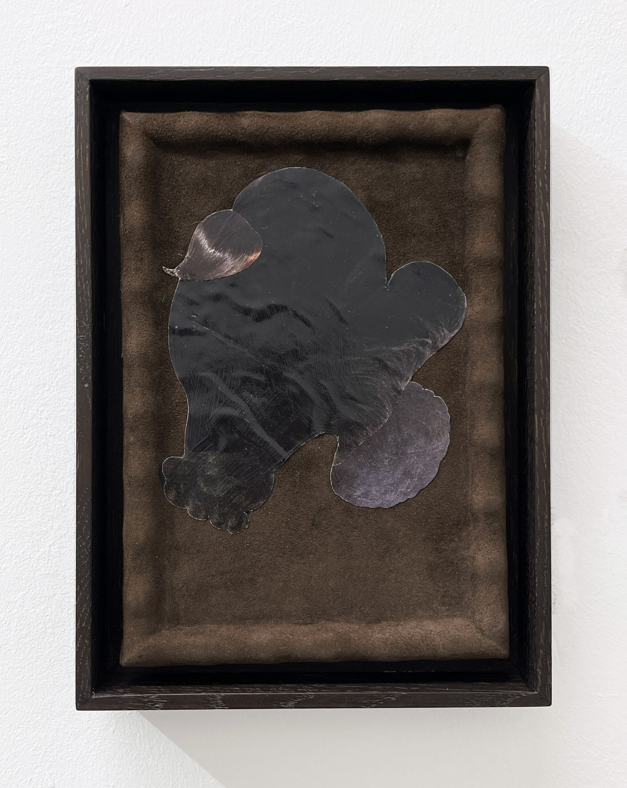 Anys Reimann	
NEST, 2021	
Collage on suede and stretcher	
framed 22,5 x 17 x 3,5 cm