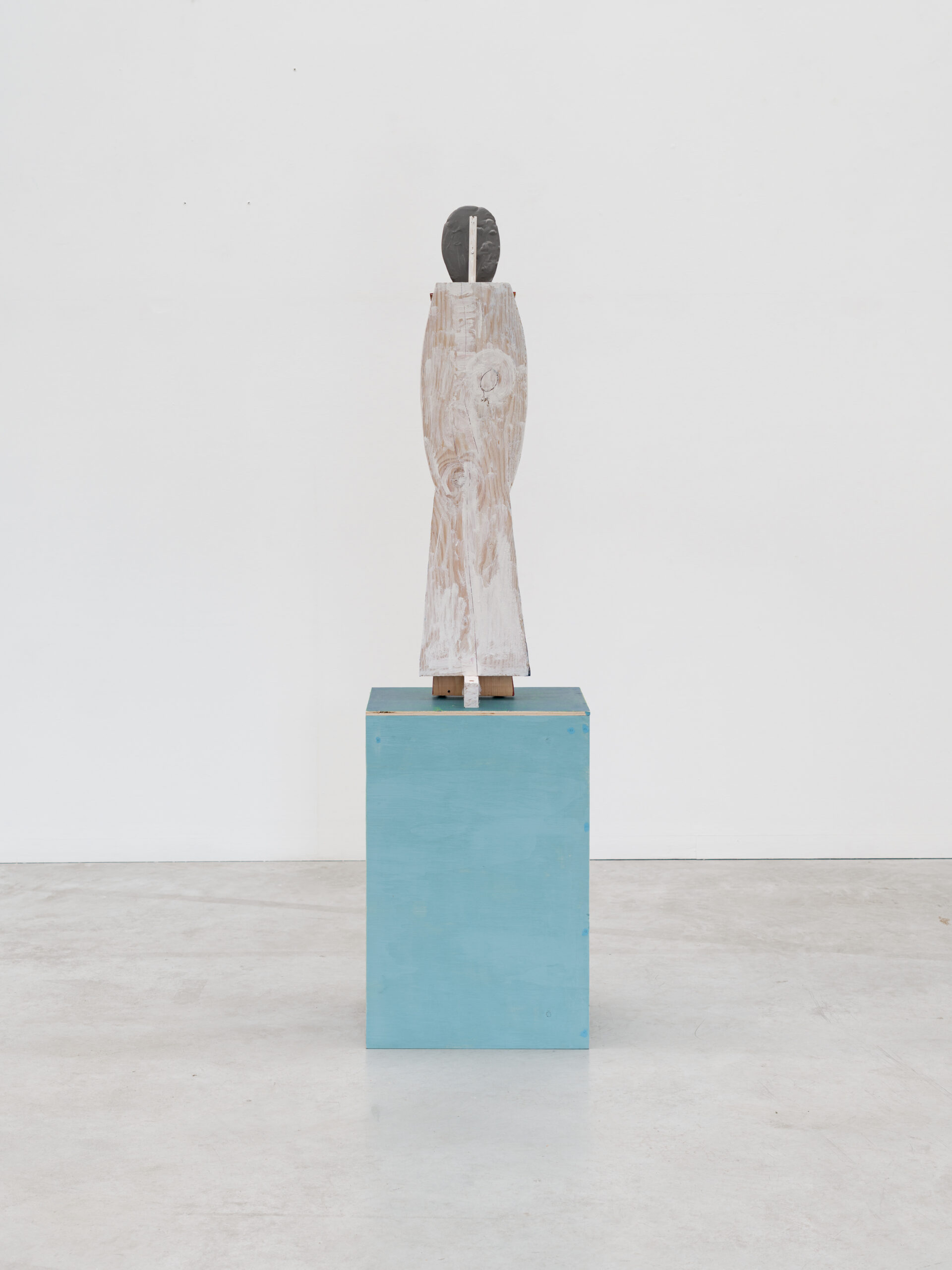 Dirk Zoete, Surprised by Red, 2025, wood, plasticrete, metal, rubber, wooden pedestal, 95 x 21 x 23 cm