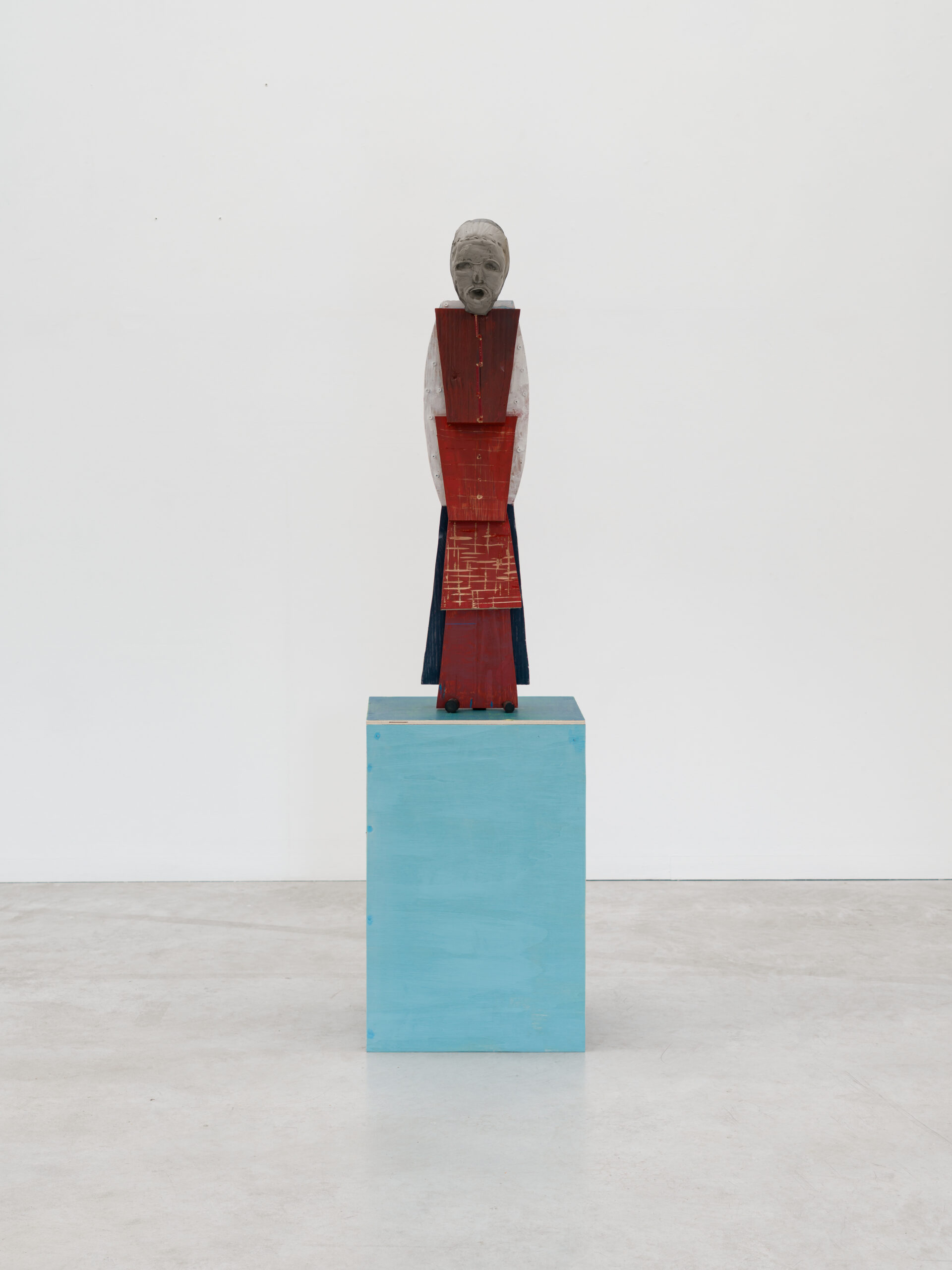 Dirk Zoete, Surprised by Red, 2025, wood, plasticrete, metal, rubber, wooden pedestal, 95 x 21 x 23 cm