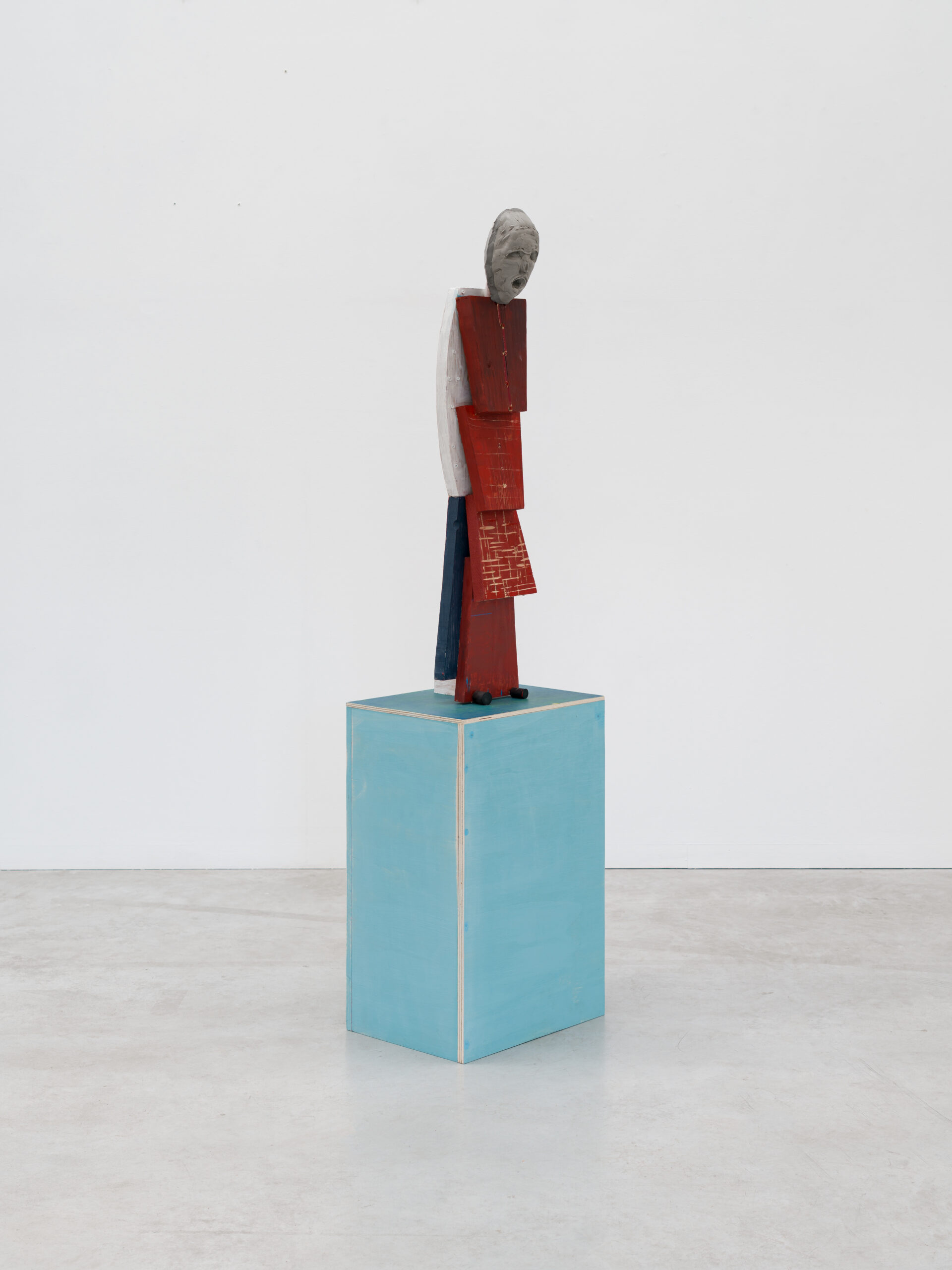 Dirk Zoete, Surprised by Red, 2025, wood, plasticrete, metal, rubber, wooden pedestal, 95 x 21 x 23 cm