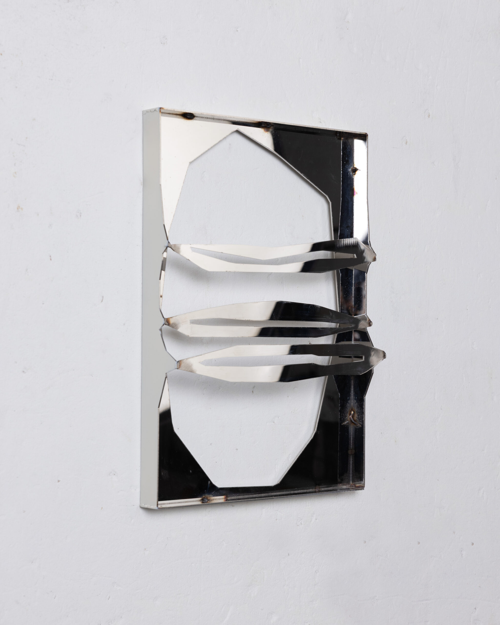 Indrikis Gelzis, Time Camouflage: Three Squinted Openings, 2026, Stainless steel, 42 x 30 x 5 cm, unique